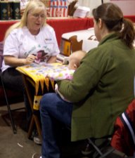 Liz reads cards at the Expo